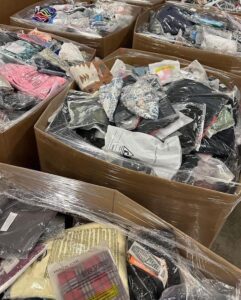 assorted mixed clothes pallets